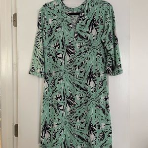 Stretchy 3/4 length sleeve dress. Mid thigh length